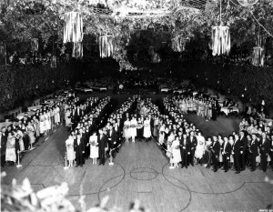 Students at the 1922 J-Hop spell out the college initials after the Grand March.